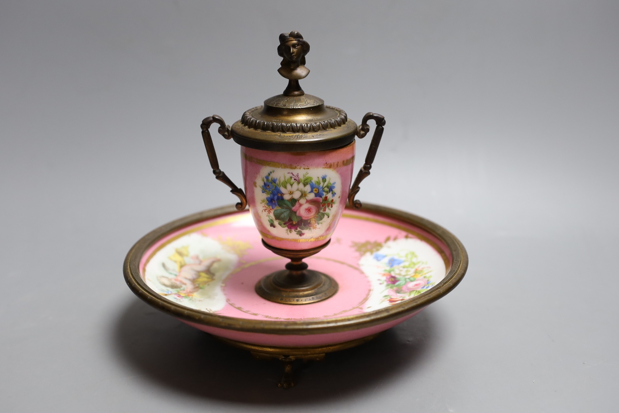 A Sevres style pink ground porcelain and gilt metal mounted inkwell, 18cm tall